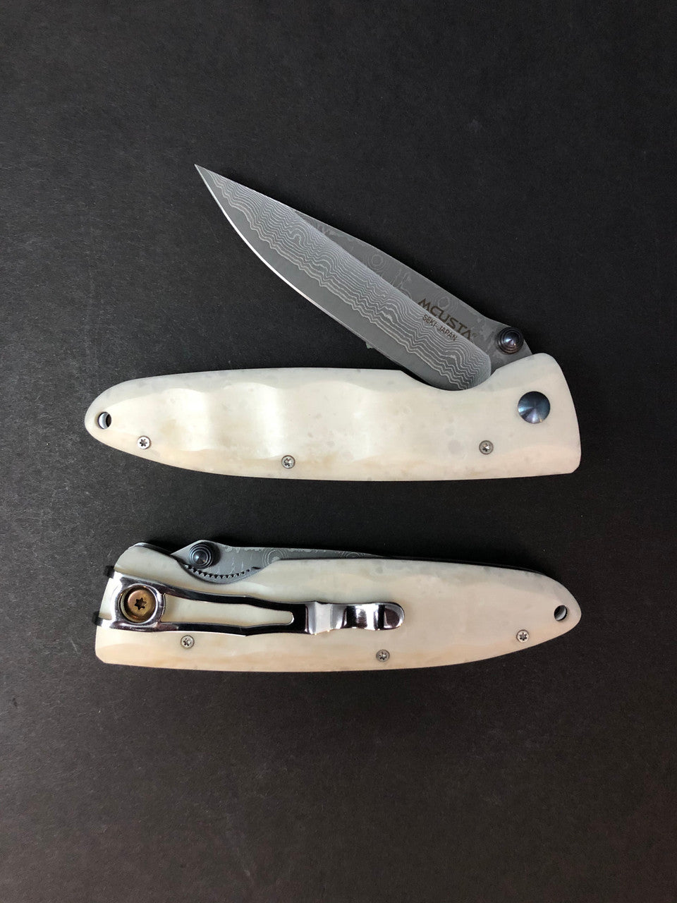 MCUSTA | Classic Wave | Damascus | Corian Knife in Steel by - Coutelier